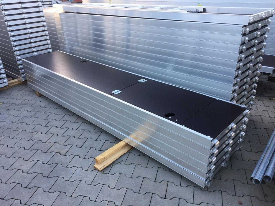 Rusztowanie elewacyjne stalowe typ Baumann Nowe 8,3x12,28=100 m2 kompletne, podest stalowy 3,07 m