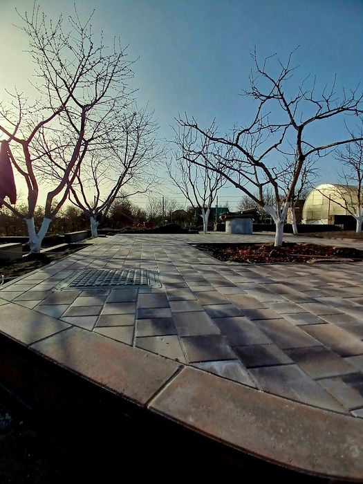 Укладня бруківки, (тротуарної плитки))