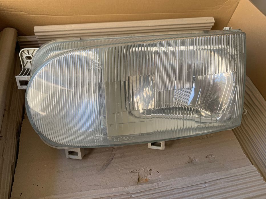 Farol Optica Nissan Vannete Esquerdo