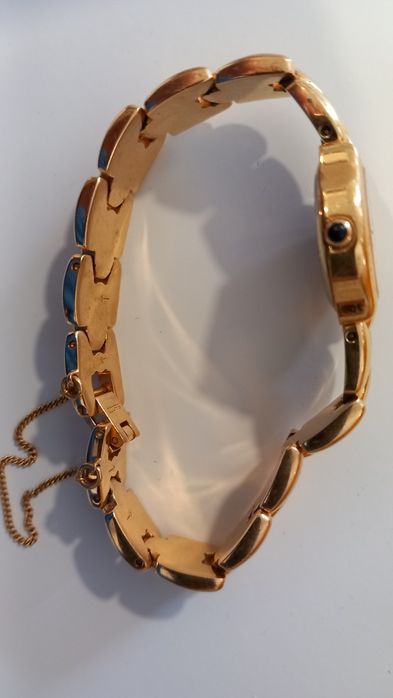 Relogio Oriente dourado