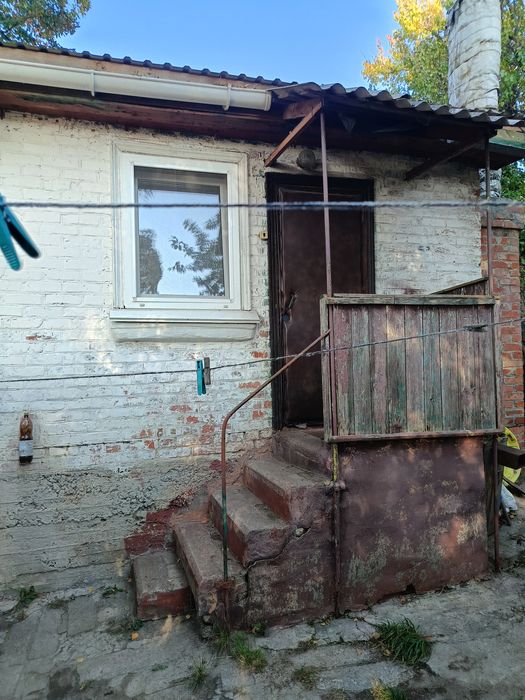 Продаж частини будинку поруч з центром