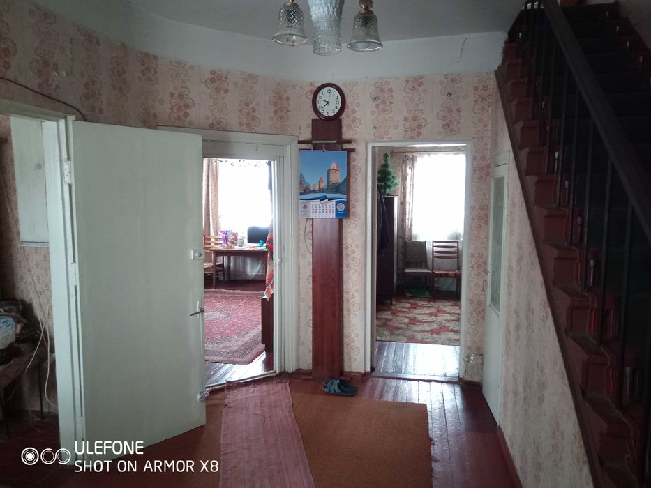 Двоповерховий будинок (половина) Нові Петрівці