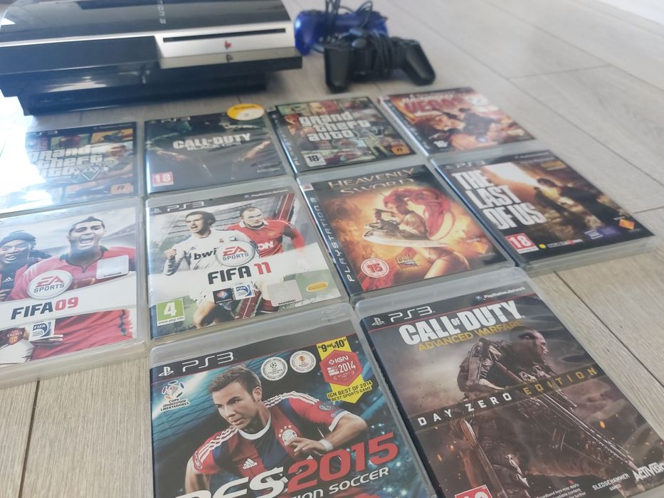 Sony PS3 + 2 comandos + 10 jogos