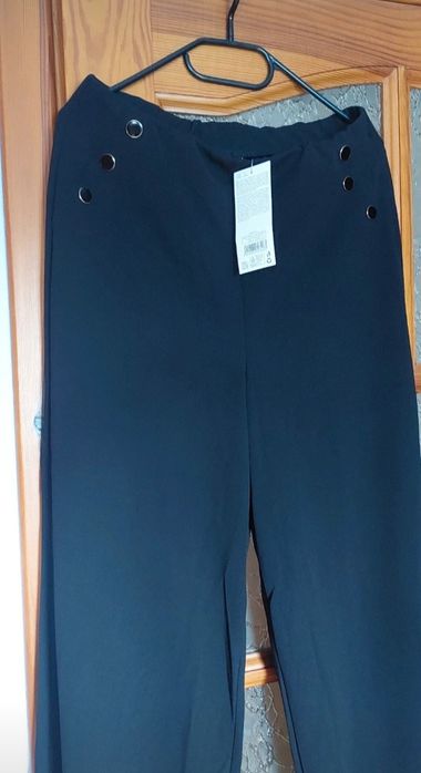 Nowe spodnie szersze proste M/L
