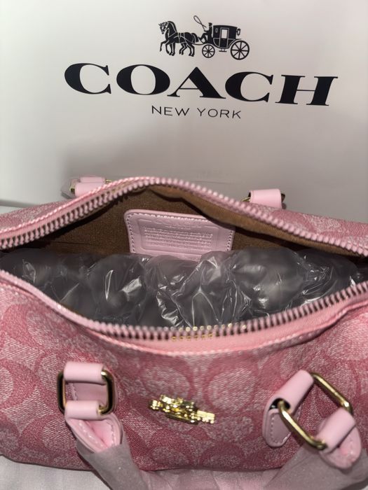Mala Coach rosa nova