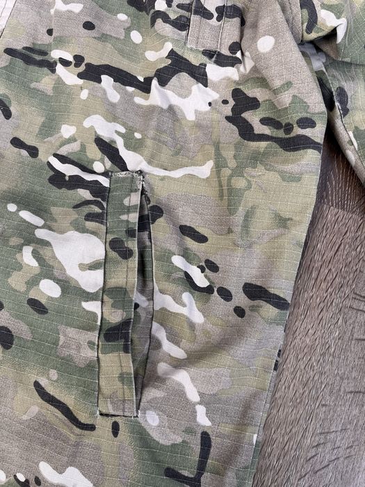 Продам куртку мультикам б/у