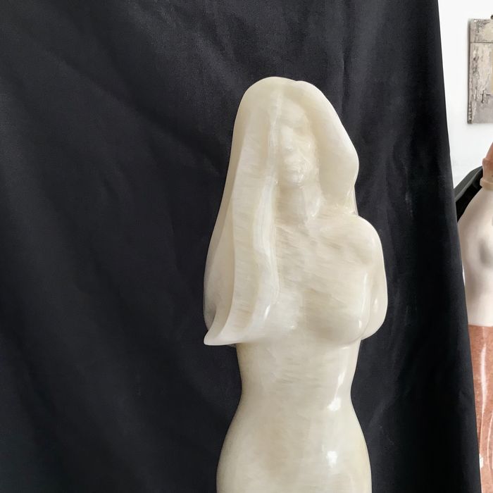 Escultura em pedra onix