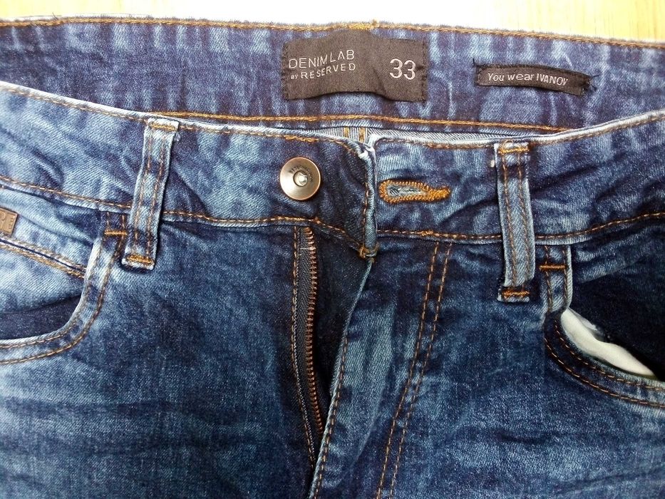 Spodnie męskie jeans Reserved r. 33