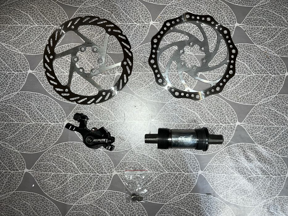 ДЕШЕВО! Велозапчастини: ротори, каретка, замок ланцюга