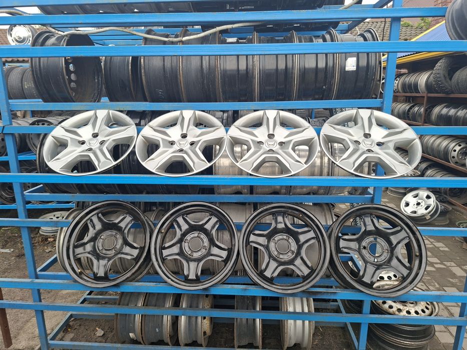 Диски структурні металеві з ковпаками 4/100 R16 6J ET37 Dacia Renault .