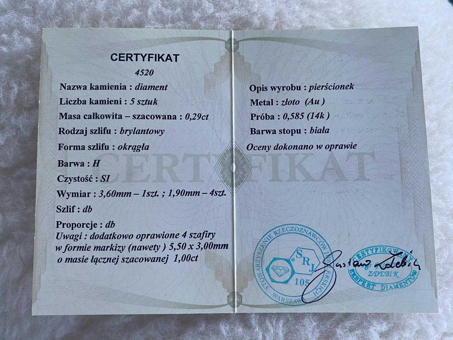 Pierścionek z białego złota z diamentami szafirami