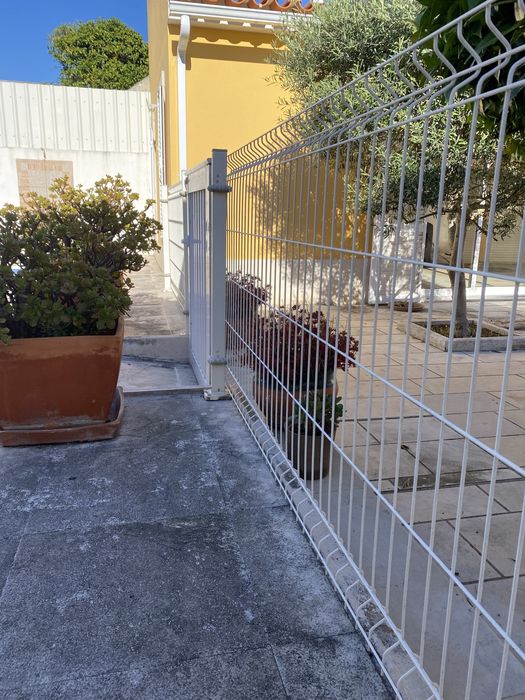 Vedacao com portâo aluminio