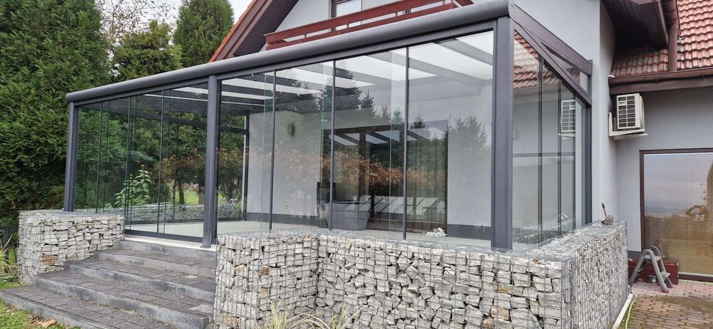 Szklane ogrody zimowe ogrody pergole zadaszenia tarasu