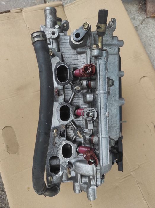 ГБЦ головка блока Toyota Duet 1.0i12v Daihatsu Materia,Xenia Sirion