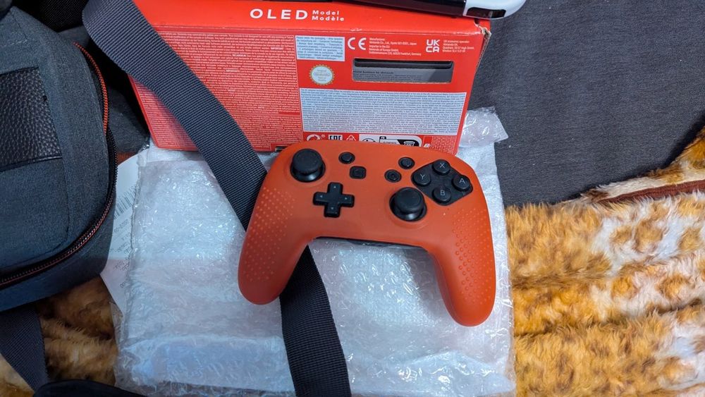 Switch oled com sd 128gb +extras