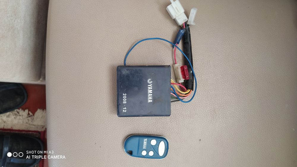 Продам брелок сигналізації YAMAHA з електронним модулем.