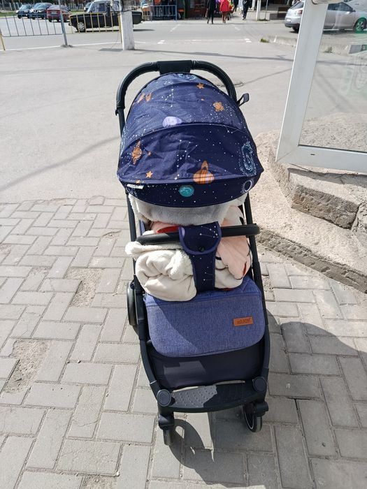Дитяча прогулянкова коляска