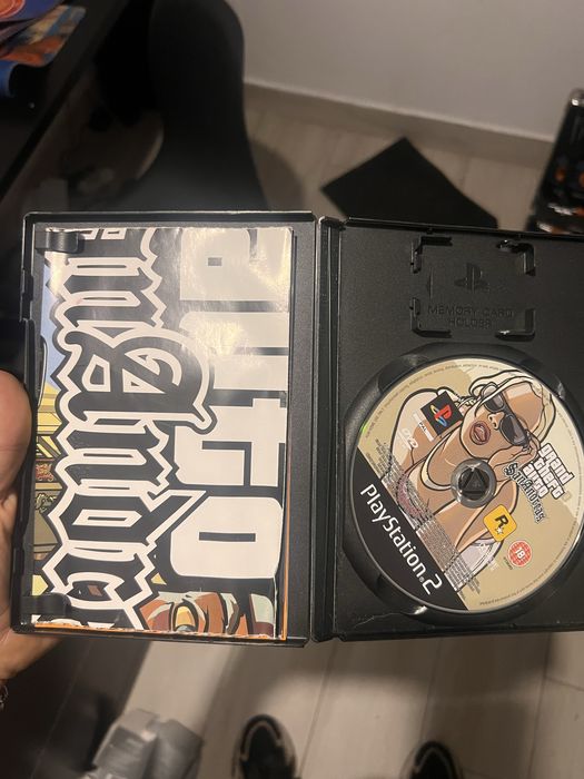 Ps2 com dois jogos e comando