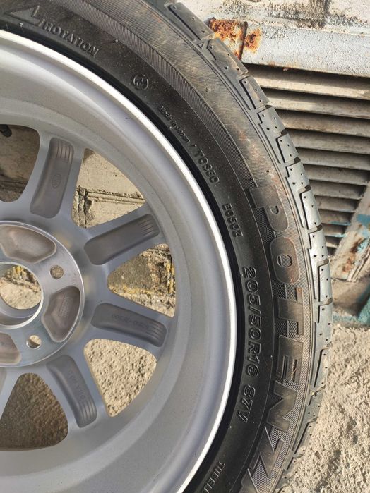 Bridgestone Potenza RE050 205/50 R16 87V + Диск kia 16" et43 4x114,3