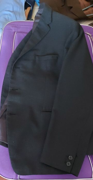 5 casacos pretos e castanhos