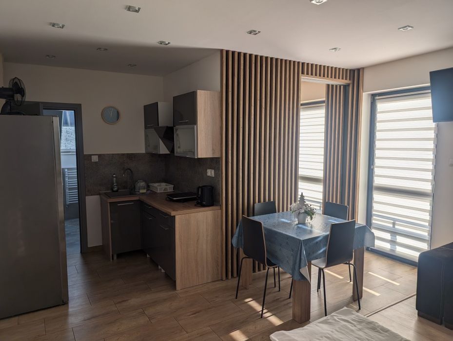 Apartamenty Pokoje w ofercie również domek