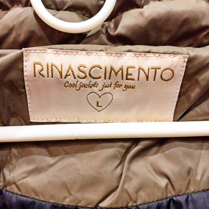 Продам женский молодежный пуховик производства Италия