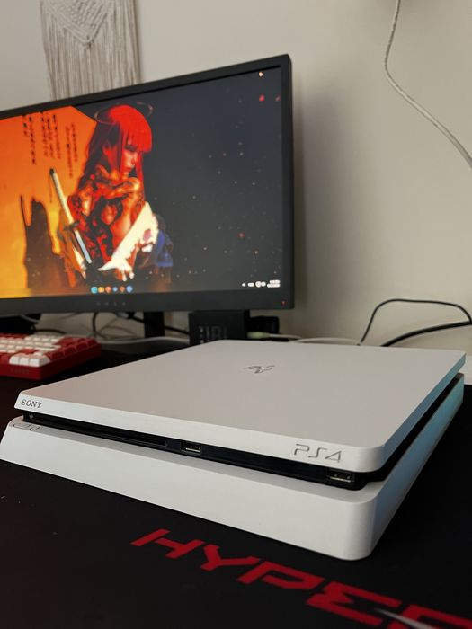 Playstation 4 branca com comando e caixa