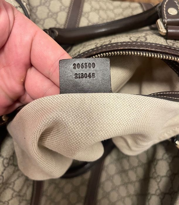 Gucci Travel Bag Monogrammed Coated Canvas
Beige