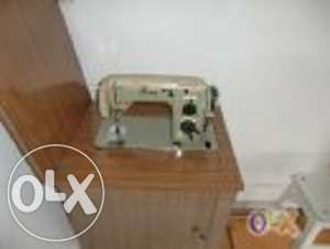 Máquina costura oliva.64176298885635120