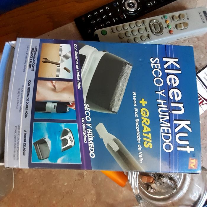 Máquina de barbiar e aparador