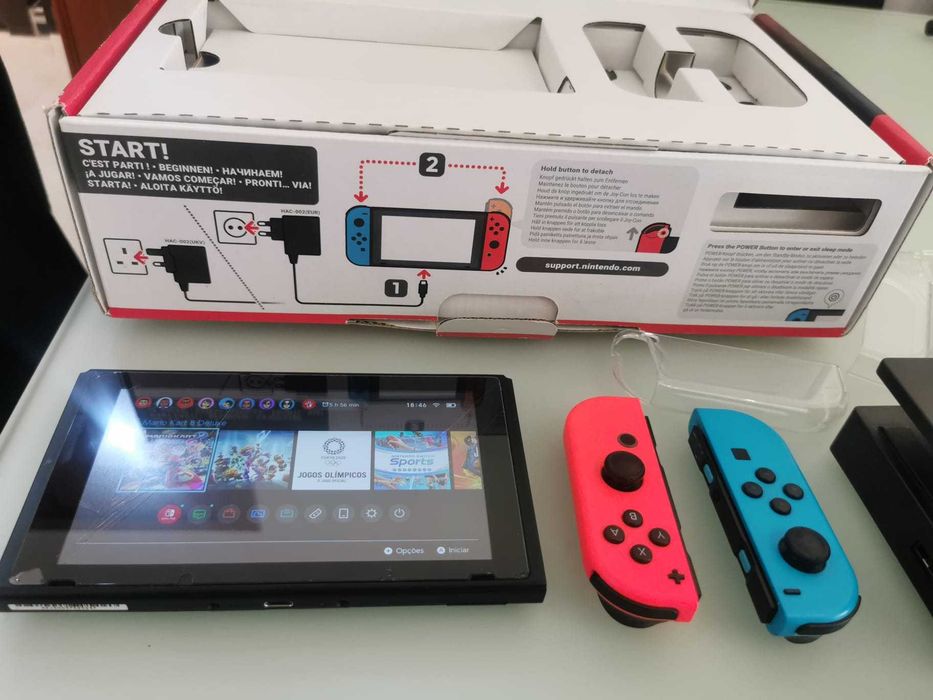 Nintendo Switch completa na caixa com 2 Jogos