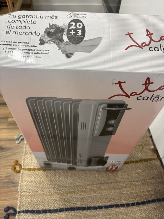 Aquecedor eletrico com a caixa original