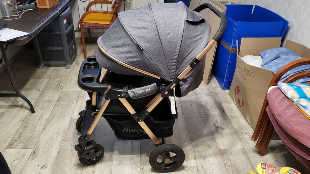 Нова  коляска  NINOS MAXI GREY сірого кольору  в повному комплекті