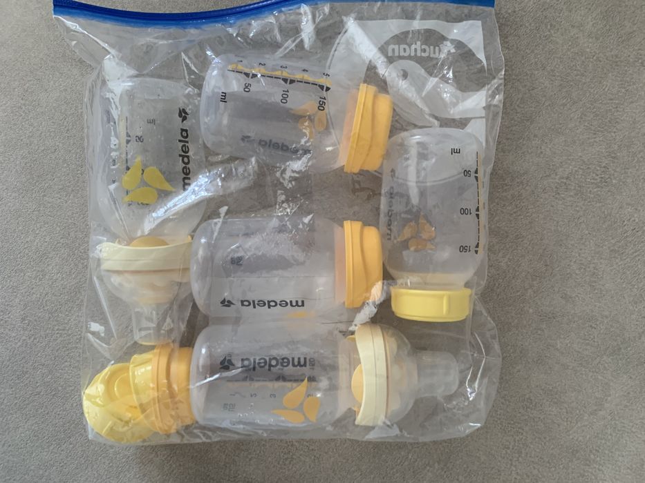 Biberoes, silver cups, bomba medela