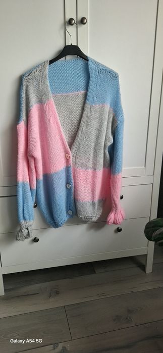 Sweterek multi r uni nowy