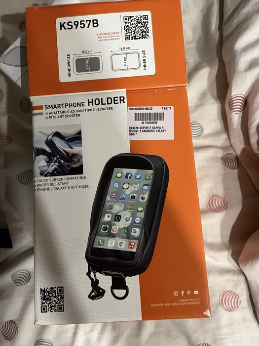 Vendo suporte para telemovel com proteccao da chuva novo