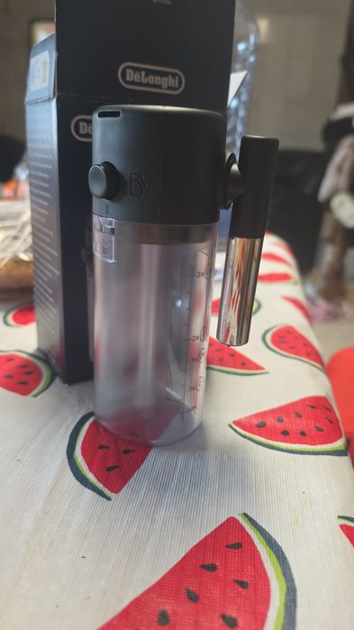 Máquina cafe delonghi magnifica evo