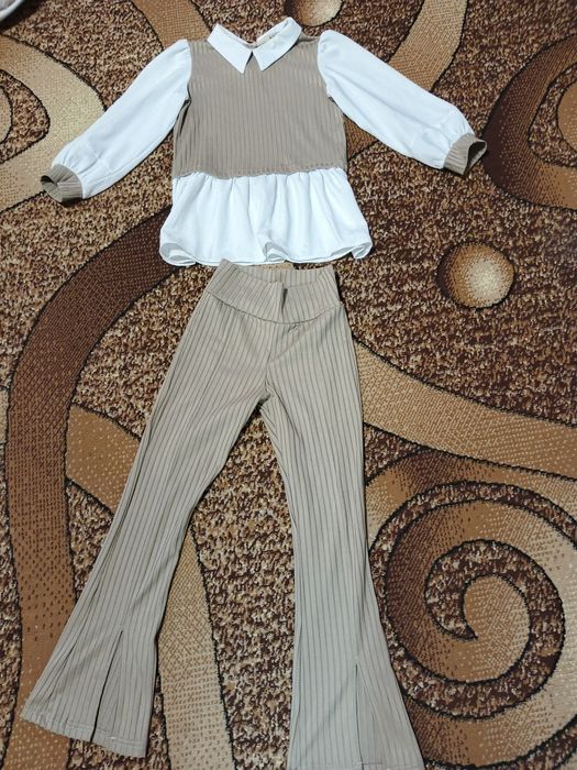 Нарядний, стильний костюм на дівчинку у школу