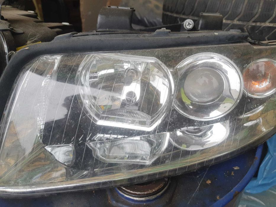 Lampy reflektory Depo Audi A4 B6 + żarówki (krótkie LED) komplet