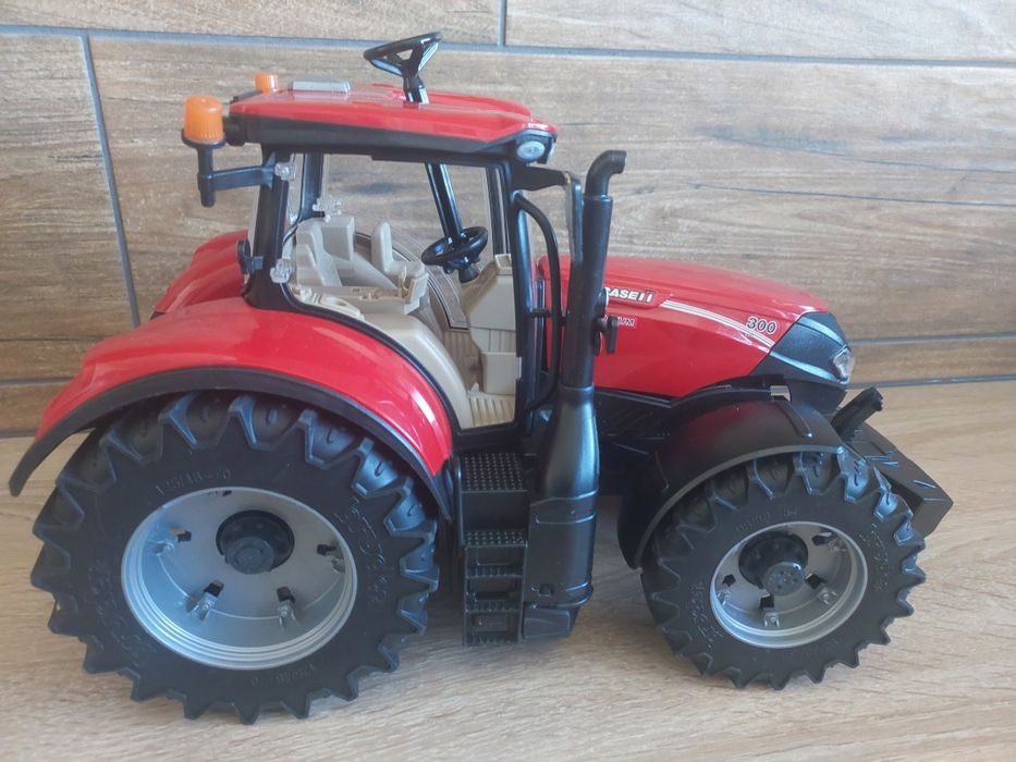 BRUDER  traktor Case IH Optum 300 + 2 przyczepy + pług