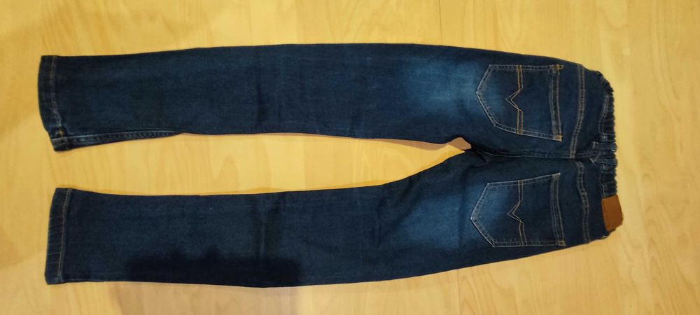 Spodnie chłopięce granatowe jeans Reservet rozmiar 152