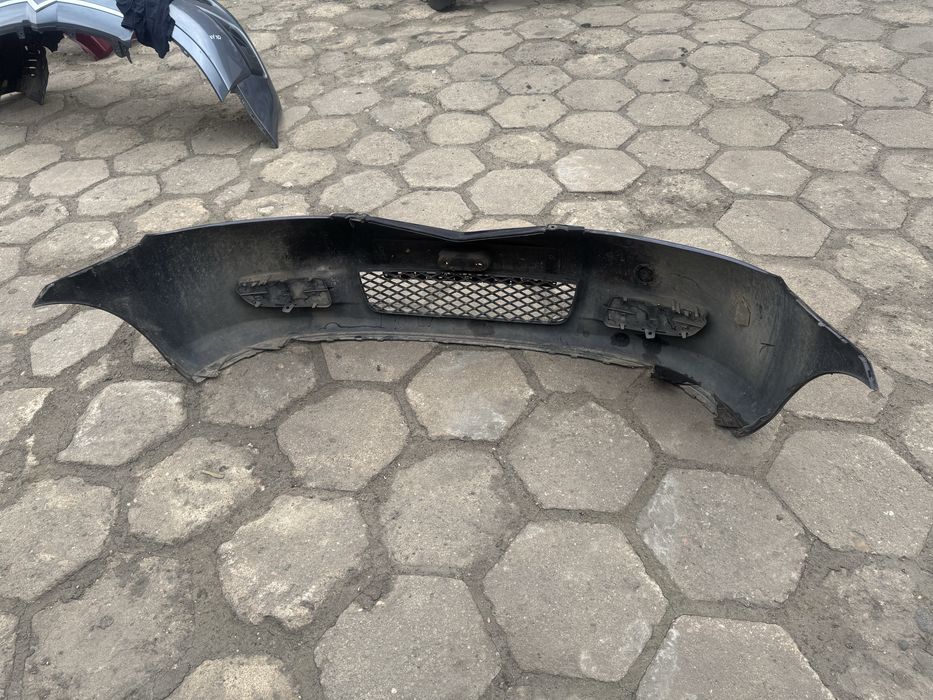 Бампер передній мазда 2  MAZDA 2 02- 3M71-17K819-E