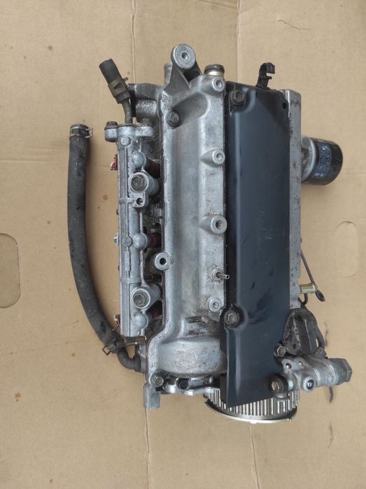 ГБЦ головка блока Toyota Duet 1.0i12v Daihatsu Materia,Xenia Sirion