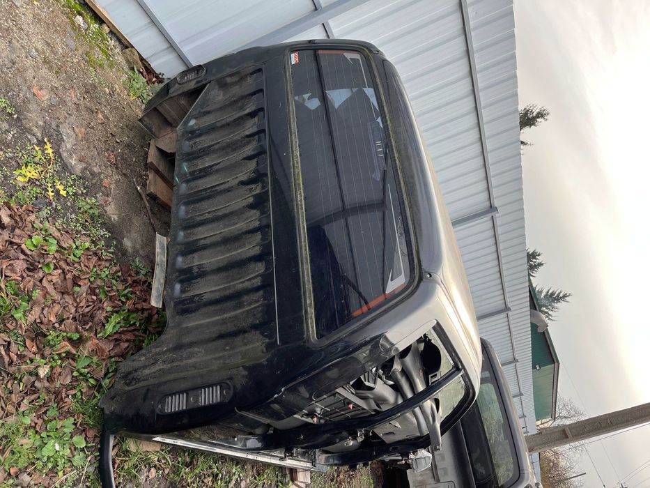 Заднє скло заднее стекло кузова  NISSAN NAVARA D40 Ниссан Навара Д40