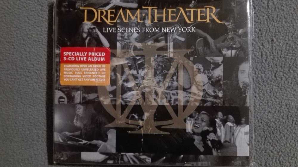 CDs selados dos Dream Theater e KISS