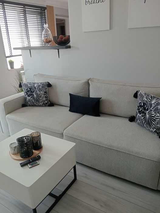 Siwa sofa rozkładana z funkcją spania