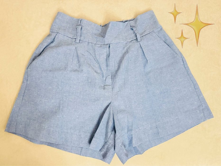 Блакитний льняний костюм