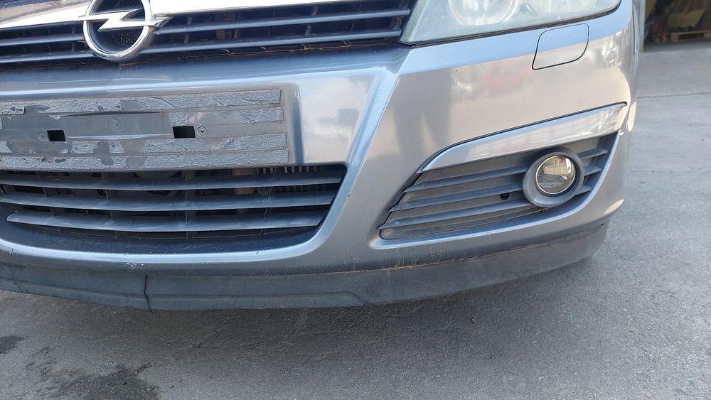 Pára-choques frente OPEL Astra H Caravan (L35)