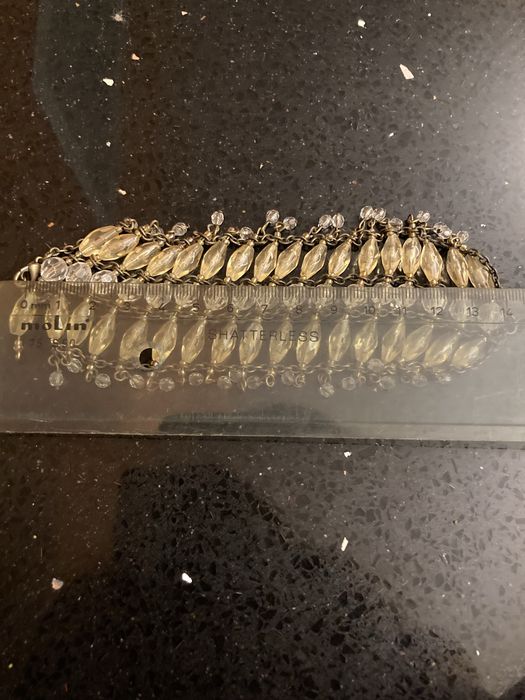 Pulseira com pedras amarelas/transparentes