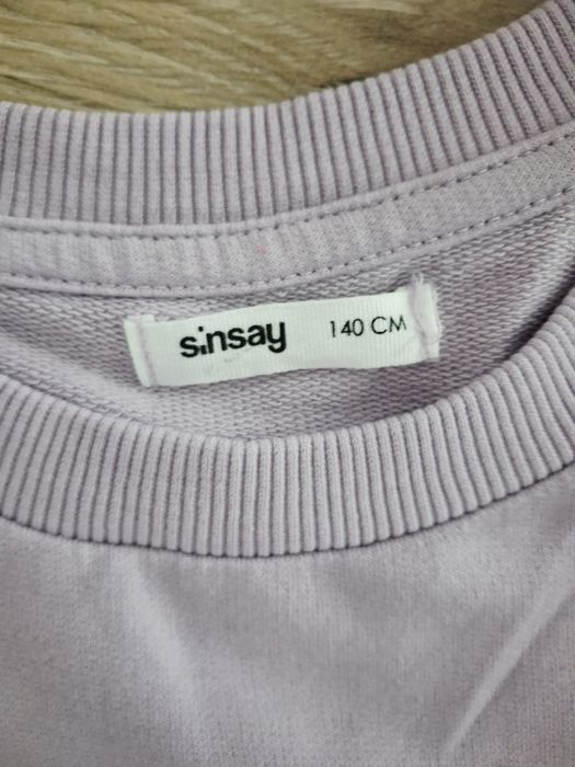 Fioletowy sweterek dla dziewczynki lub chłopca unisex